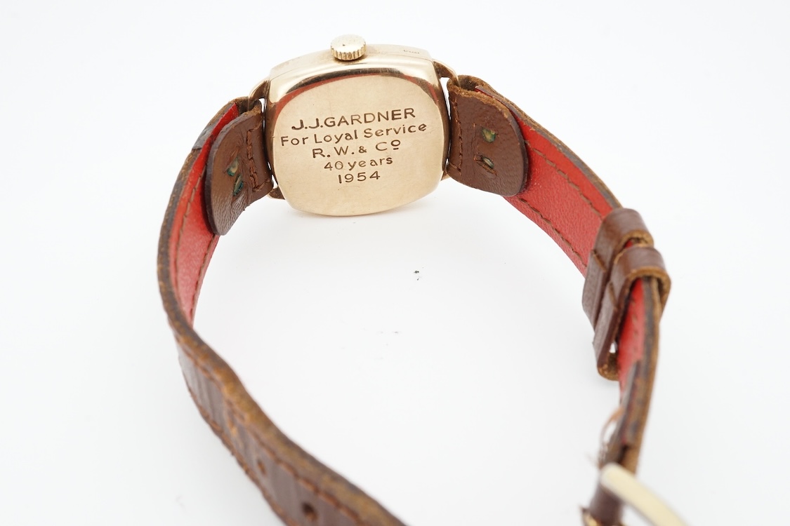 A 1950's 9ct gold Tudor Royal manual wind wrist watch, with Arabic dial, case diameter 27mm, with case back inscription, on a later associated strap.